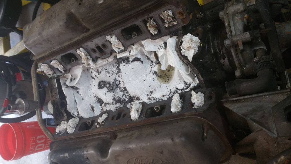 Engine block intake ports stuffed with paper towels