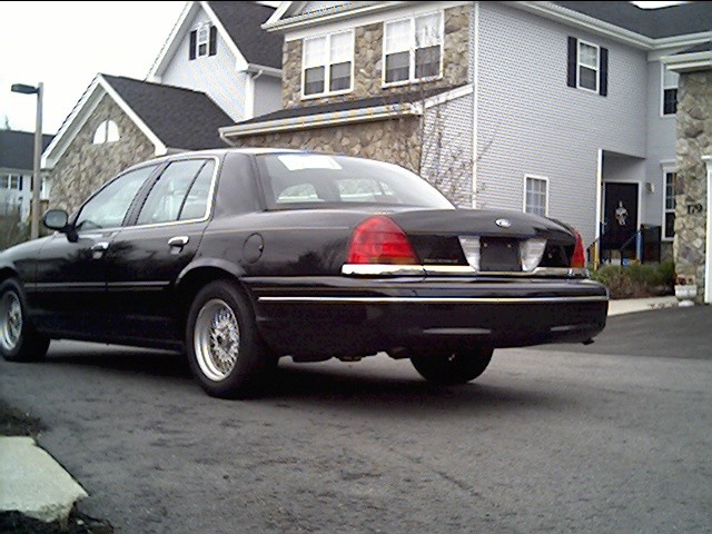 Black 1999 Ford Crown Victoria rear view