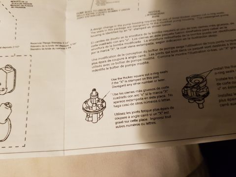 1978 Ford Bronco - This is a close-up of a document with technical diagrams and text in English, Spanish, and French. The document appears to be instructions…