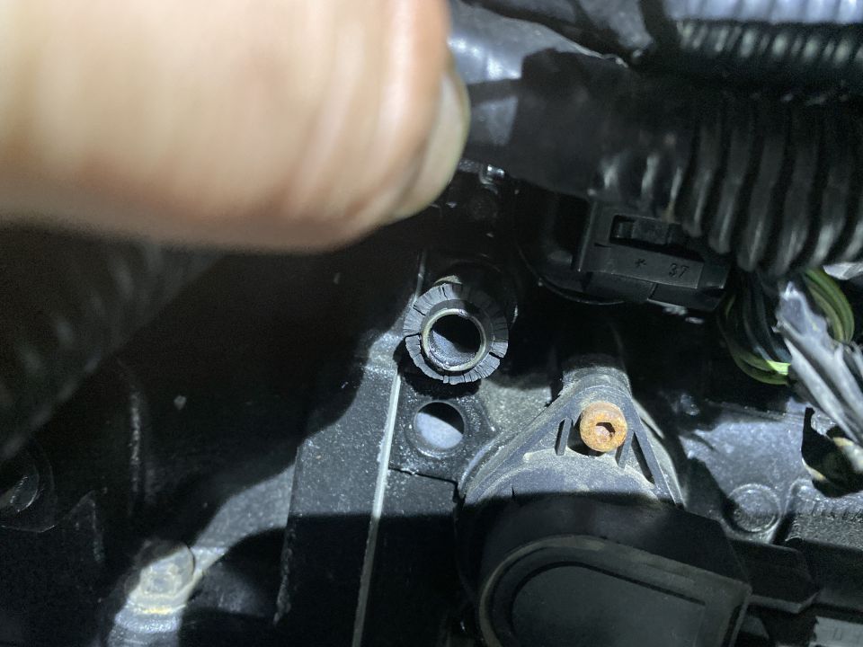 Close-up of engine component with electrical connector