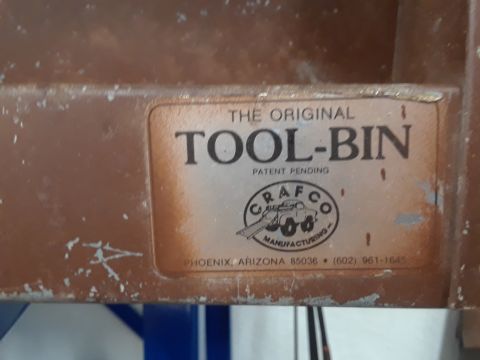 1994 Ford Bronco - A close-up view of a label on a brown metal surface reads "THE ORIGINAL TOOL-BIN PATENT PENDING" with a circular logo below that says "CRAF…