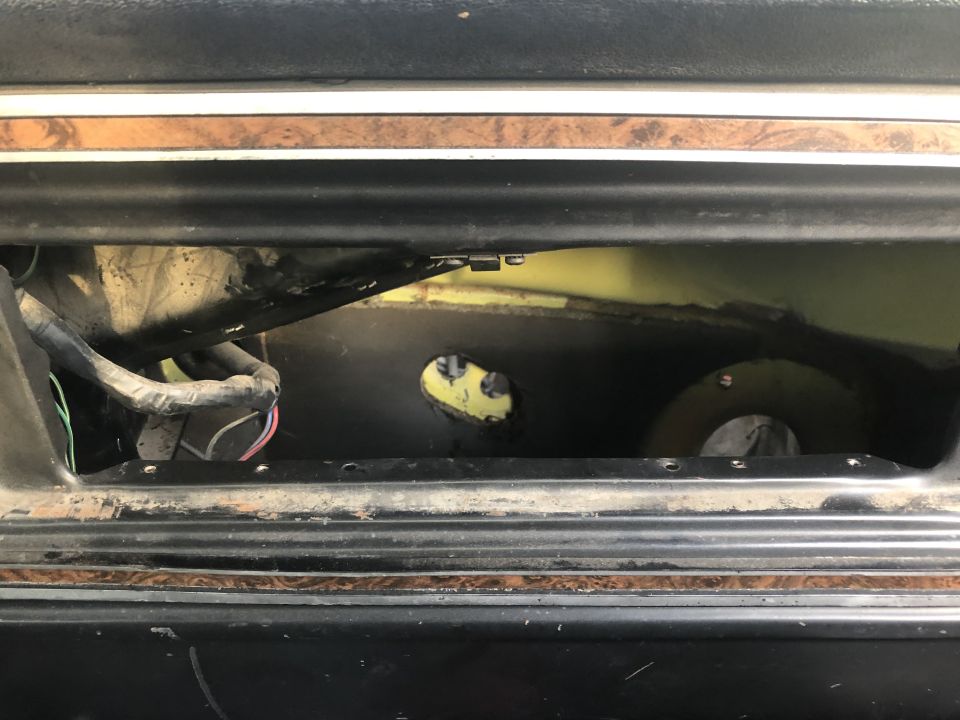Interior dashboard with exposed wiring and ductwork.