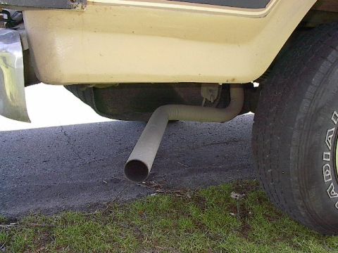 1986 Ford Bronco - less than impressive stock style 2 1/4" tailpipe with plenty of kinks and poor ground clearance