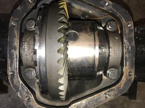 1989 Ford Bronco - Close-up view of a differential gear assembly, showing internal components and some part numbers.