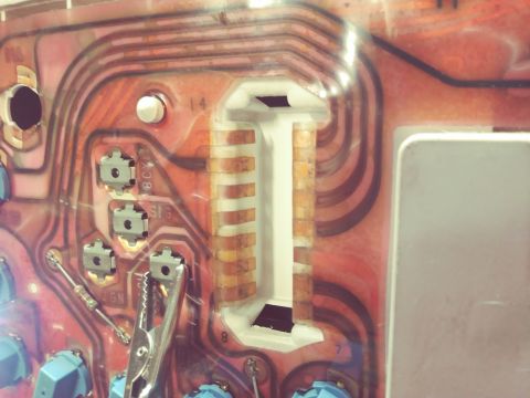 1996 Ford Bronco - Close-up of a vehicle's interior circuit board, showing intricate wiring and connection points.