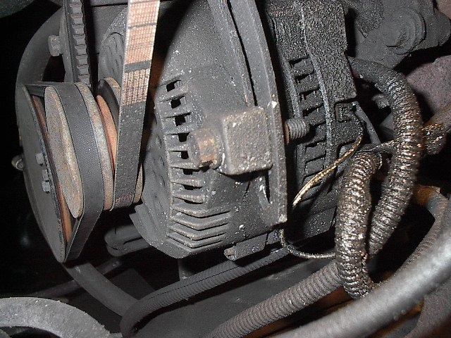 3G 1995 Mustang 130 amp alternator with 4 gauge wire right off stud direct to Little 175 amp Mega Fuse distribution block. Note small white wire with tracer.