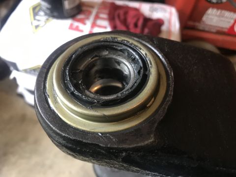 1989 Ford Bronco - This close-up shows a heavily worn ball joint, likely needing replacement.