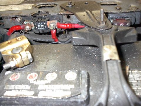 1986 Ford Bronco - 4 gauge coming from alternator stud on left, through 175 amp fuse to a.) the solenoid and b.) to the Maxi fuse then 4 gauged to amps.
