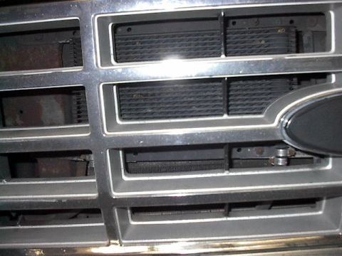 1986 Ford Bronco - One large 1 1/2" thick B&M trans cooler. Priced your trans lately ? Get one of these.