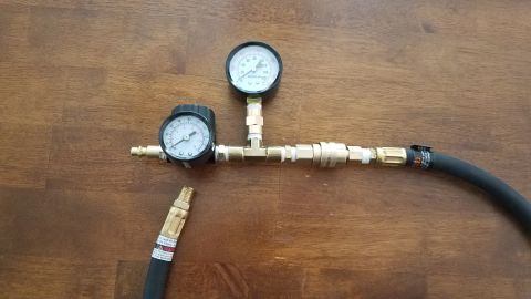 1985 Ford Bronco - Custom-built leakdown tester two pressure gauges and quick-connect fittings.