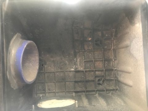 2000 Ford Explorer - Close-up of an air intake box interior showing a silicone coupler.
