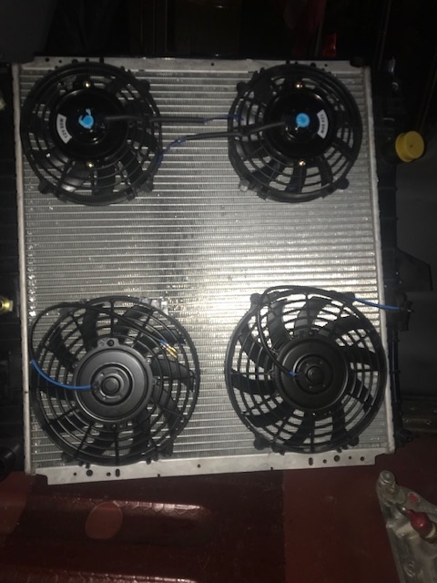 2000 Ford Explorer - A radiator unit is fitted with four electric fans for cooling.