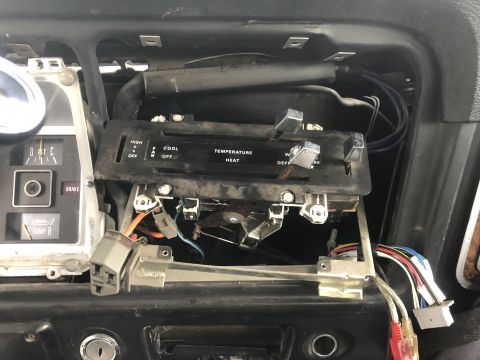 1979 Ford Bronco - Dashboard climate controls and gauges removed for repair in a 1979 Ford Bronco.