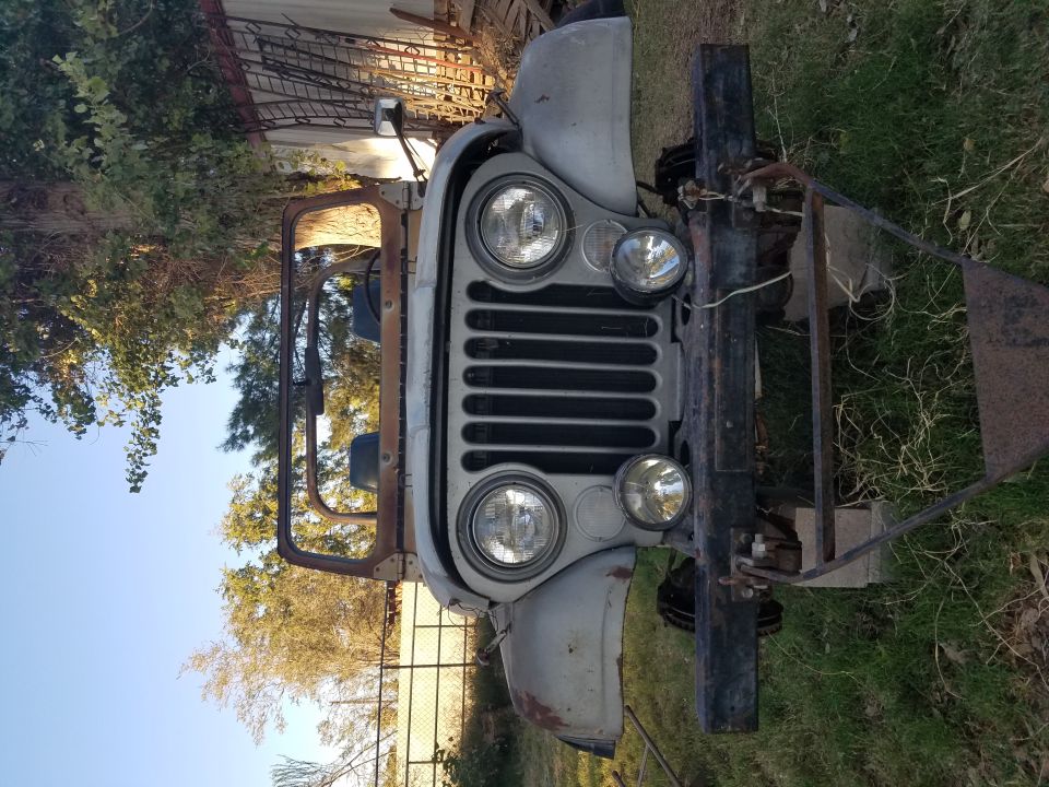 1977 Jeep CJ5 front end with round headlights and vertical grille