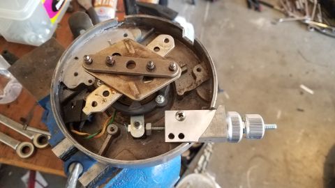 1985 Ford Bronco - This photo shows a disassembled distributor, a component of a vehicle's ignition system, not the entire vehicle.