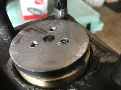 1989 Ford Bronco - A mechanical part is shown in detail, with visible bolts and a metallic finish.