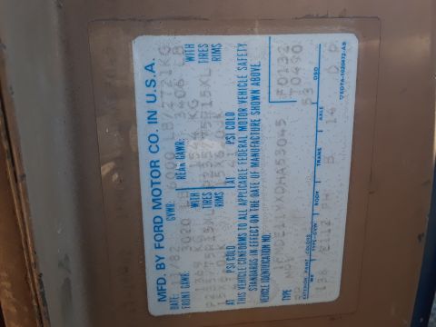 1994 Ford Bronco - Vehicle identification sticker from Ford Motor Co. shows manufacturing details.
