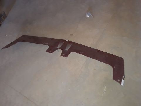 1994 Ford Bronco - A single car fender flare is shown lying on a concrete surface.