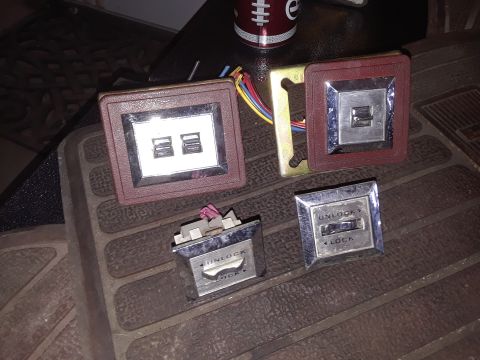 1994 Ford Bronco - Collection of power window and lock switches, some with maroon bezels and others chrome.