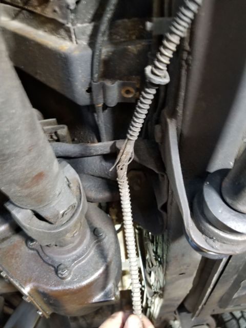 1974 Ford Bronco - Because its tab wasn't attached to the body, the front cable had been pinched between the floor & the transmission crossmember. Both rear c…
