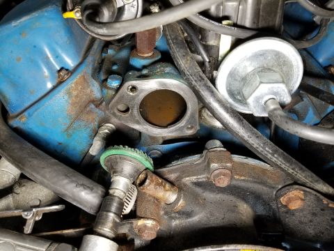 1974 Ford Bronco - Fortunately, the intake manifold isn't damaged. I also chased the threads. I've ordered a new cast Iron cover (Four Seasons 84831) and I'll…