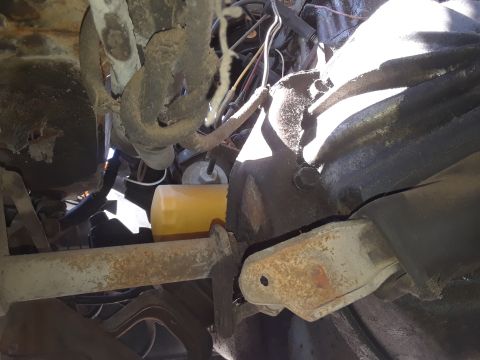 1994 Ford Bronco - Underside view shows an oil filter and suspension components, not a complete vehicle.