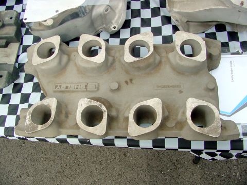 1969 Ford Mustang - This Shelby intake manifold, part number 9-0270-0500, is displayed on a checkered tablecloth.