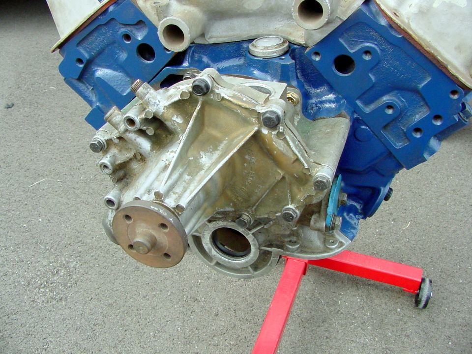 Engine block with water pump assembly, blue painted components