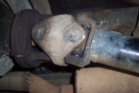 1995 Ford Bronco - Driveshaft U-joint detail, showing wear and potential maintenance points.