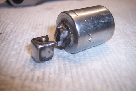 1995 Ford Bronco - A socket wrench part has broken, with a piece separated from the main body.