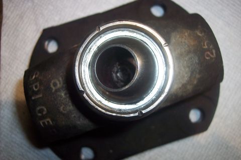 1995 Ford Bronco - Close-up of a driveshaft component with visible markings 'SPICE' and '25-6'.
