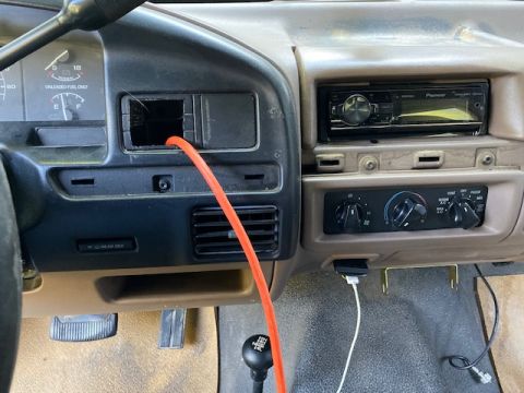 1996 Ford Bronco - Interior view of a 1996 Ford Bronco's dashboard, a Pioneer stereo and climate controls.