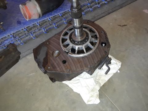 1994 Ford Bronco - A disassembled transfer case sits on a white cloth, ready for repair or inspection.