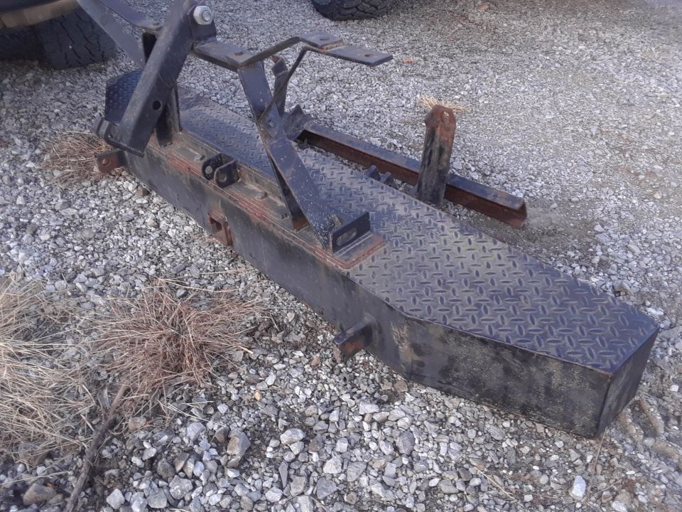 Black tow hitch receiver with diamond plate surface