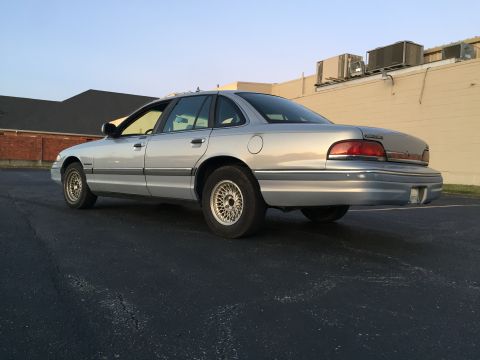 1994 Ford Crown Victoria - This 1994 Ford Crown Victoria is shown from the rear three-quarter angle.