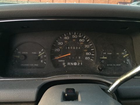 1994 Ford Crown Victoria - The odometer reads 060934 miles. The gear selector shows R, N, D, 2, 1.