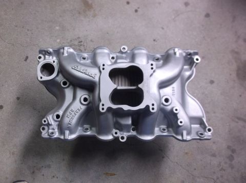 1979 Ford Ranchero - This intake manifold is labeled Edelbrock Performer RPM and has a dual-carburetor opening.