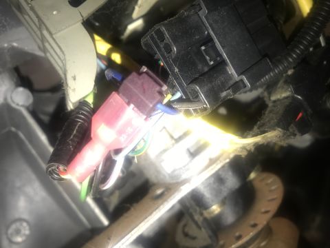 1994 Ford Bronco - This image shows a close-up of a vehicle's wiring harness, not a specific model year.