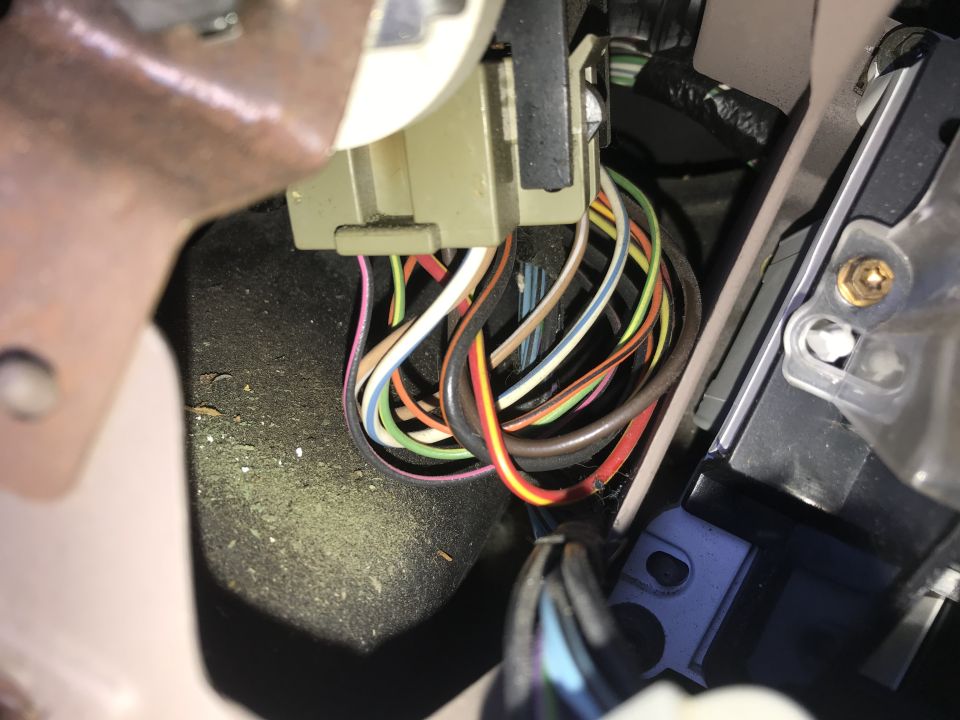 Wiring harness under dashboard with multiple colored wires