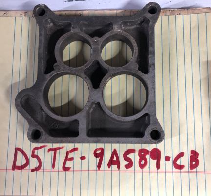 1979 Ford Ranchero - Carburetor spacer with part number D5TE-9A589-CB, likely for a Ford vehicle.