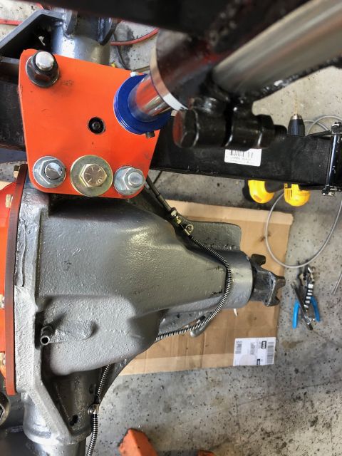 1992 Jeep Wrangler - This image shows a close-up view of a vehicle's axle and suspension components, likely during a repair or upgrade.