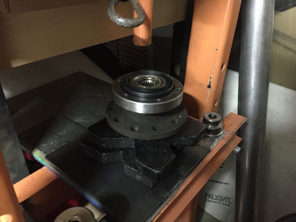 Flange and bearing assembly on press