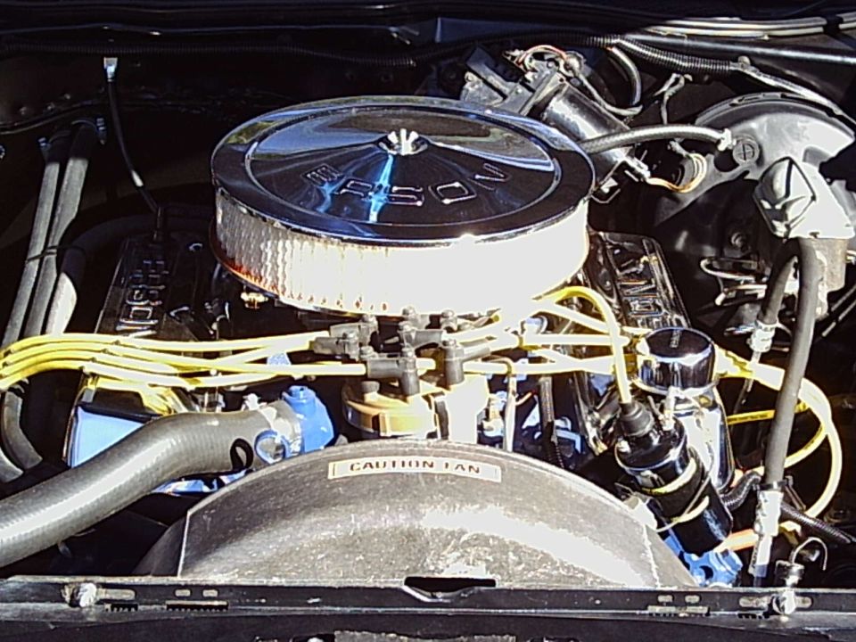 Engine bay with chrome air cleaner and yellow spark plug wires