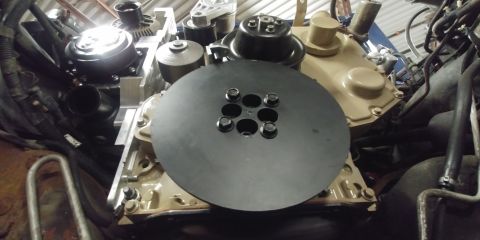 1996 Ford Bronco - 20191219 - This plate is for the tachometer sensor which is directly above this wheel at the top. Some grinding was necessary to get that b…