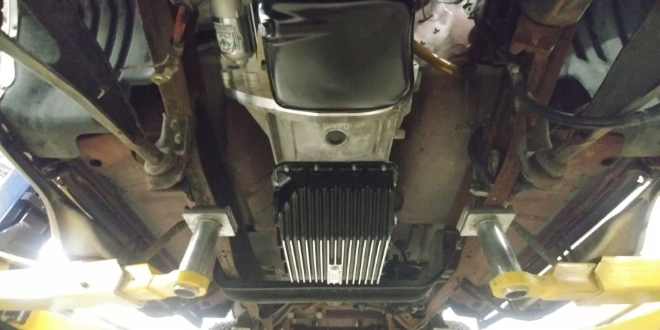 20191219 - The adapter kit from DCS made installing the engine, fitting the transmission to the engine in its original mounting location, and installing the Mean Green 6.0 starter a breeze! Also added the Mag Hytec E4OD/4R100 pan to increase the amount of fluid and cooling potential for the transmission.