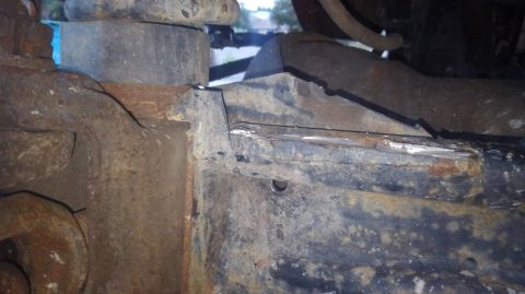 1996 Ford Bronco - i cut the old mounting tab off the radius arm so it is out of the way. the shock will not be able to reach full compression without hitting…