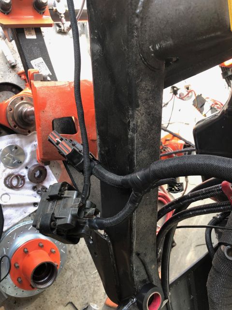 1992 Jeep Wrangler - This image shows a section of a vehicle's electrical system and a brake assembly, not a 1992 Jeep Wrangler.