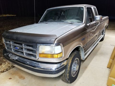 1993 Ford F-250 - The most-recent owner scrubbed the hood with stainless brillo & then hosed it down with primer, so I'm going to sand it & the wiper valance…