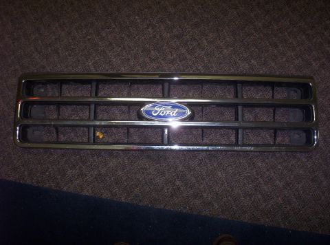 1988 Ford Bronco - A Ford grille with a blue oval emblem is shown, likely from a truck or SUV of the 1980s.