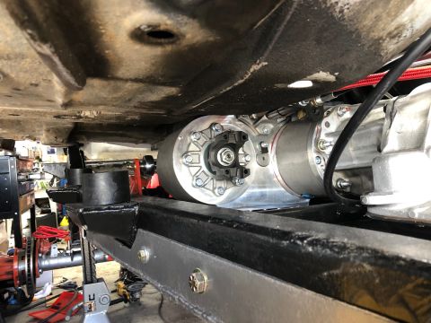 1992 Jeep Wrangler - Close-up of modified drivetrain parts, suggesting a custom build rather than a stock vehicle.